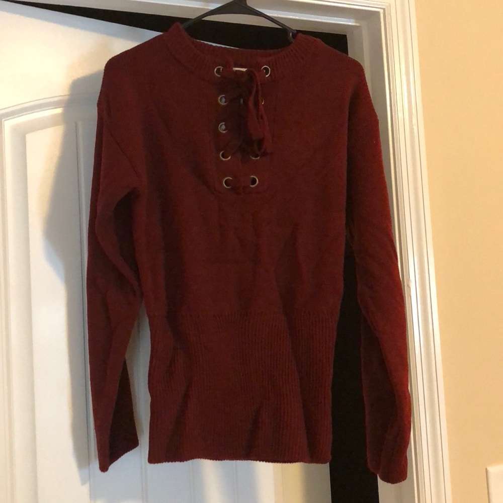 Front lace-up sweater tunic.